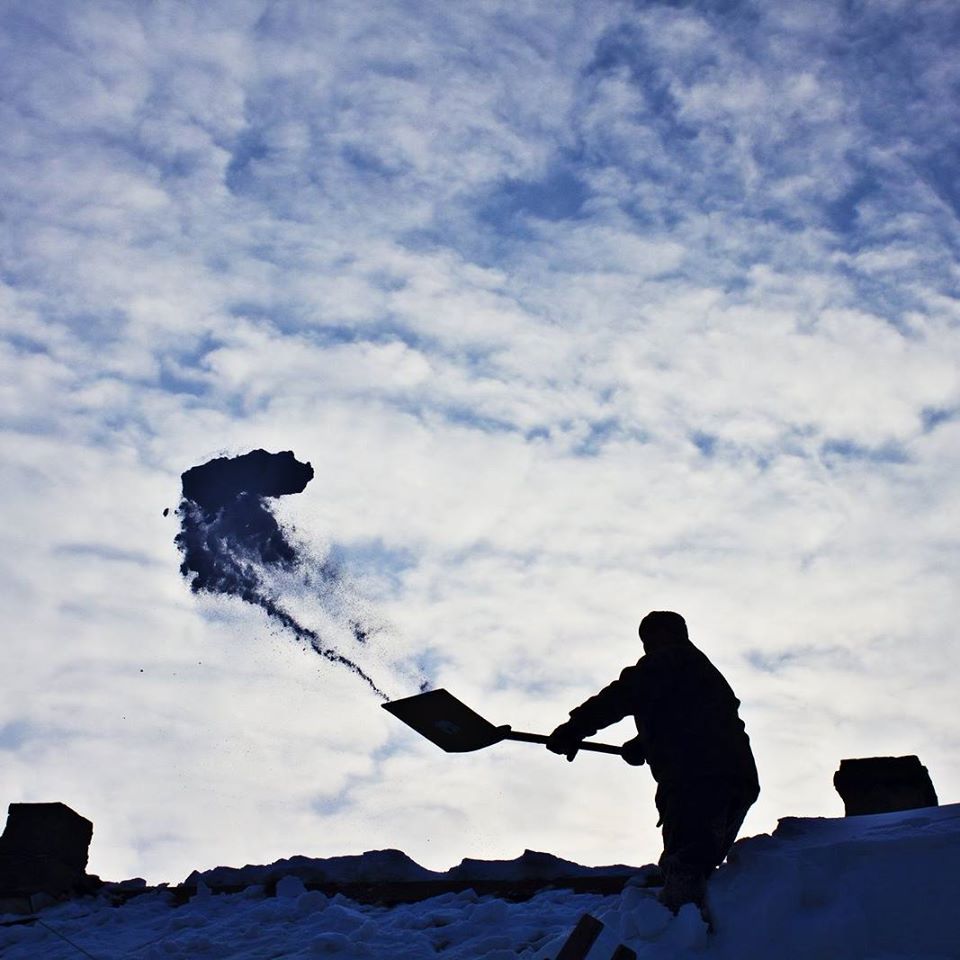 Worker Clearing Snow